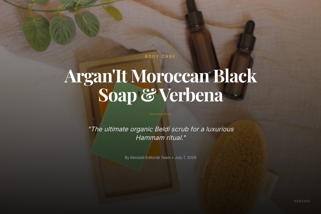 A glass jar of Argan'It Organic Moroccan Black Soap with Argan Oil & Verbena next to a wooden