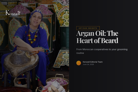 Close-up of hands holding golden Moroccan Argan oil next to Argan nuts and a traditional mortar