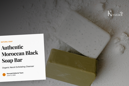 Handcrafted Moroccan black soap with neroli essential oil sitting on marble surface