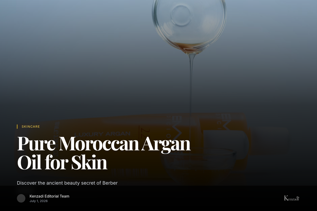 A hand holding a dark glass bottle of golden argan oil being dropped onto another hand, with argan