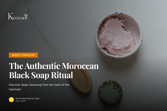 A traditional bowl of dark Moroccan black soap paste next to an exfoliating Kessa glove on a textured