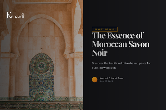 A traditional Moroccan hammam setting with a jar of dark black soap, a kessa exfoliating glove, and copper